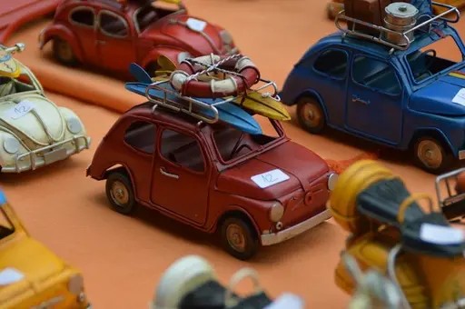 Several miniature model cars displayed together